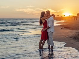 Photo by Summer Stock: https://www.pexels.com/photo/couple-kissing-on-beach-during-golden-hour-285938/