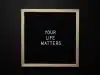 blackboard with your life matters inscription on black background