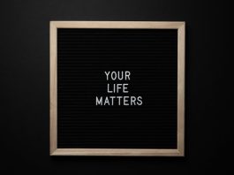 blackboard with your life matters inscription on black background