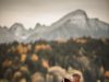 newlyweds hugging and kissing in countryside
