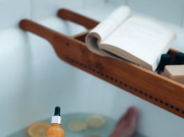 The Role of Self-Love in Healthy Relationships: A Comprehensive Guide person holding orange and black plastic bottle