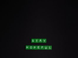 stay hopeful text on black background